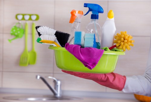 Local cleaner treating upholstered furniture with care in Sutton