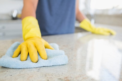 Local technician treating a stubborn fabric stain in Sutton